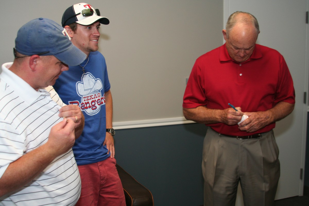Autographing baseball