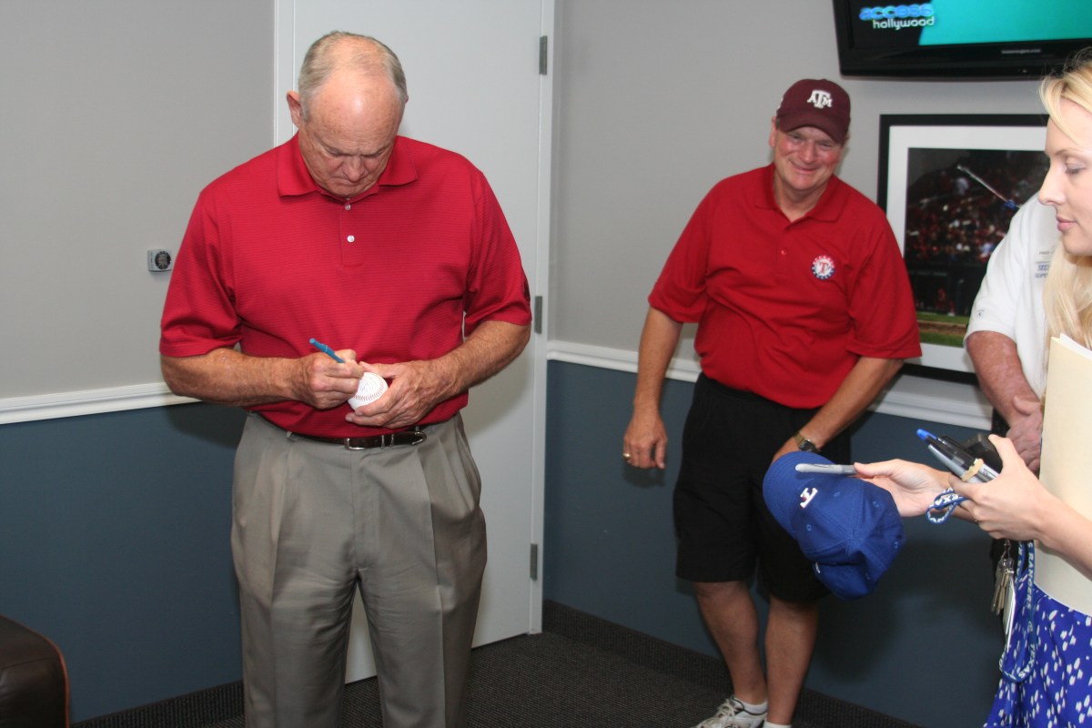 Autographing baseball