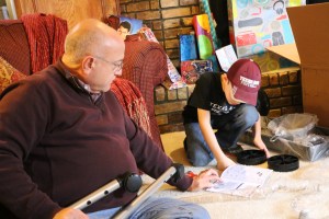 Papa J and Jackson looking at the instructions