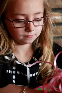 Lauren looking at presents